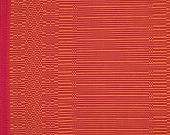 Handwoven cushion red and orange in rep weave technique
