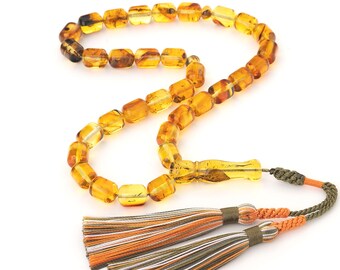 Handcrafted Baltic Amber Tasbih: Elegant Prayer Beads with Natural Inclusions