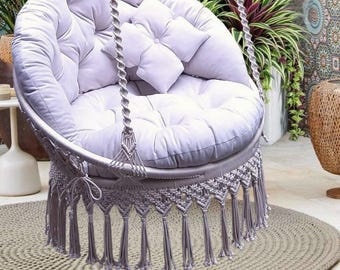 Comfortable hanging hammock chair, macrame, butterfly pattern on the back, chic, large pillows, roomy, cozy, for the whole family.