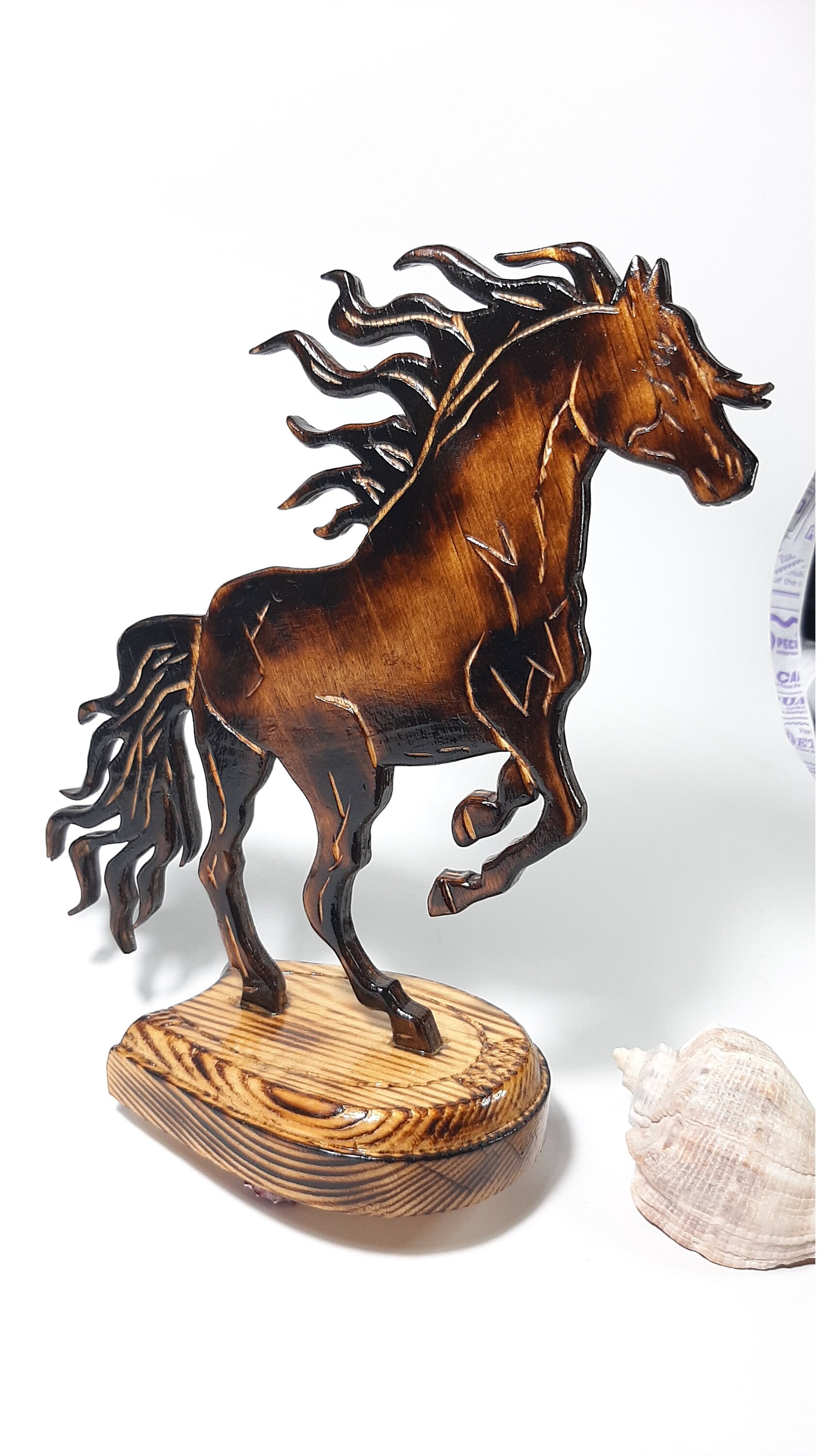 large wooden horse sculpture
