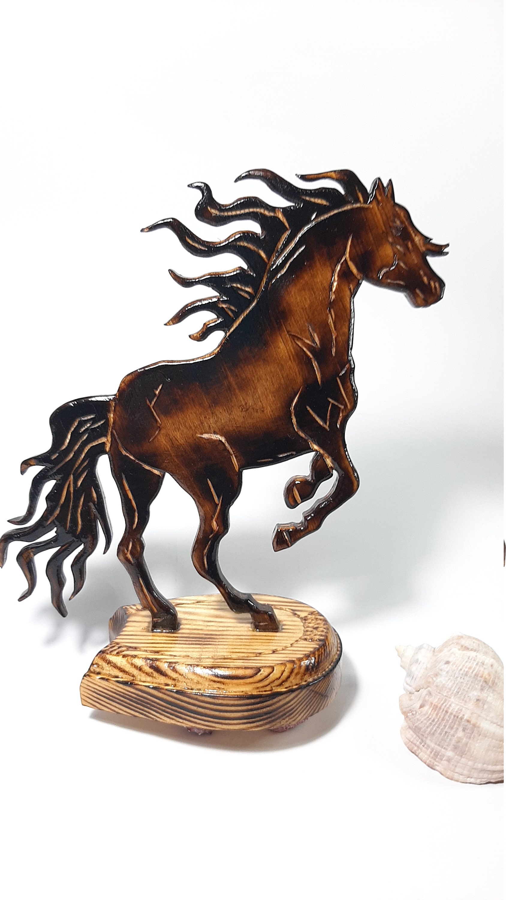 large wooden horse sculpture