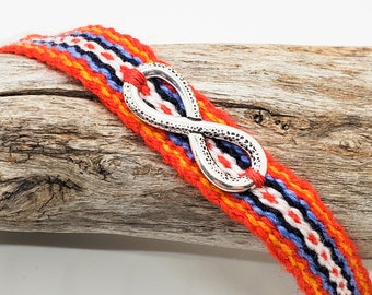 Handmade Metis Sash Bracelet with Silver Infinity Symbol - Adjustable Alpaca Wool, Red Aboriginal Design