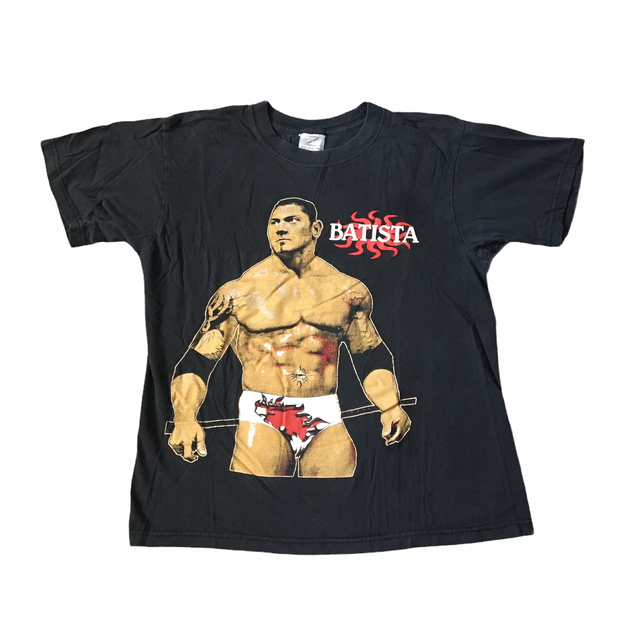 Discover Vintage 90s Batista T-Shirt