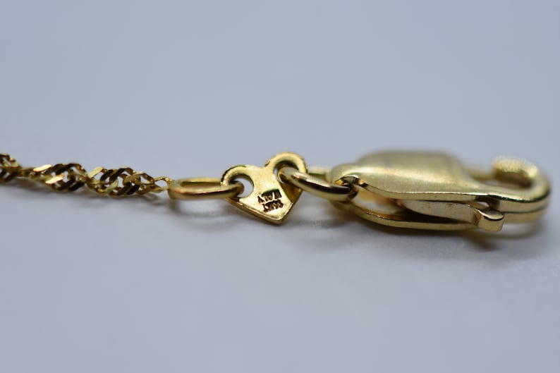 18 Inches 14k Gold Blue Topaz Necklace Pendant on a 14k Gold Rope Style Chain