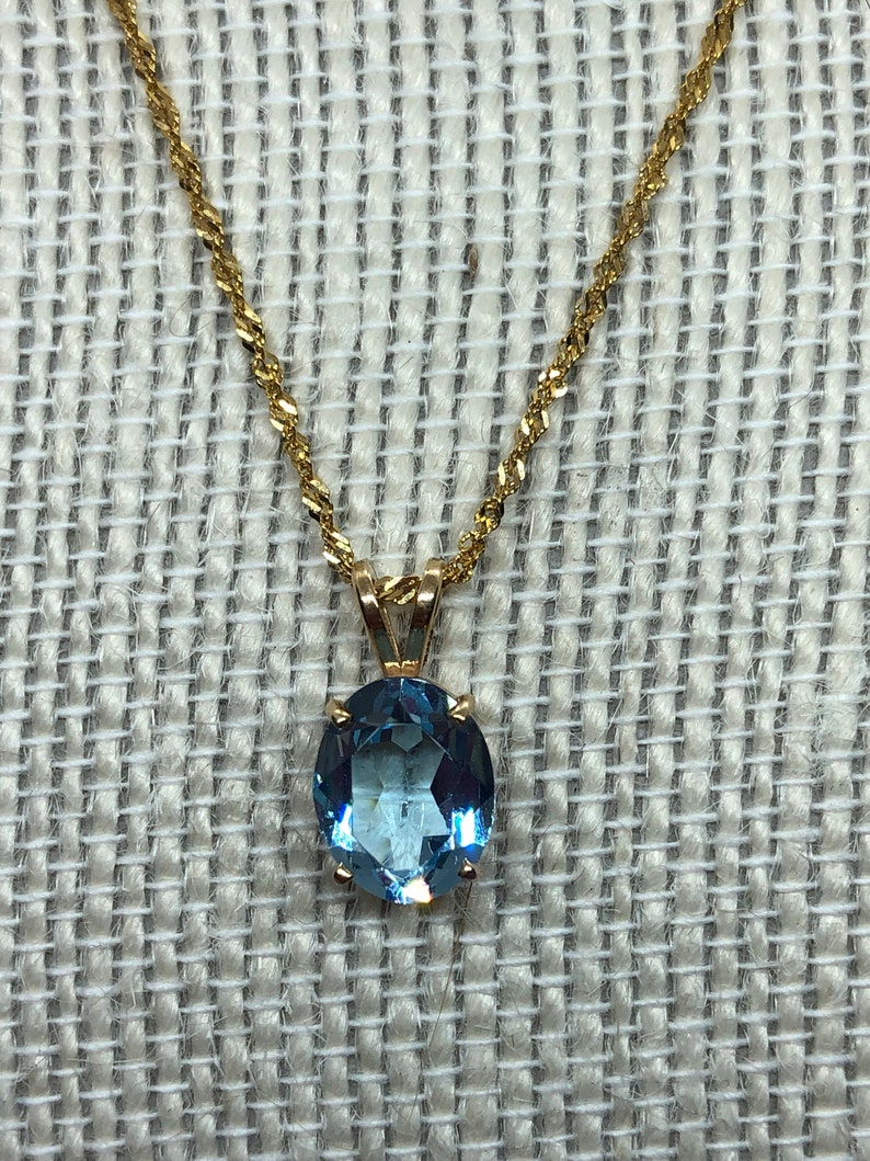 18 Inches 14k Gold Blue Topaz Necklace Pendant on a 14k Gold Rope Style Chain