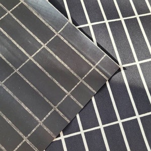 Marimekko coated fabric Tiiliskivi, waterproof black and white cotton geometric Scandinavian designer fabric