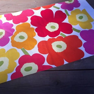 Coated waterproof Marimekko fabric Pieni Unikko, Scandinavian poppy flower fabric in yellow orange pink, new floral cotton designer fabric