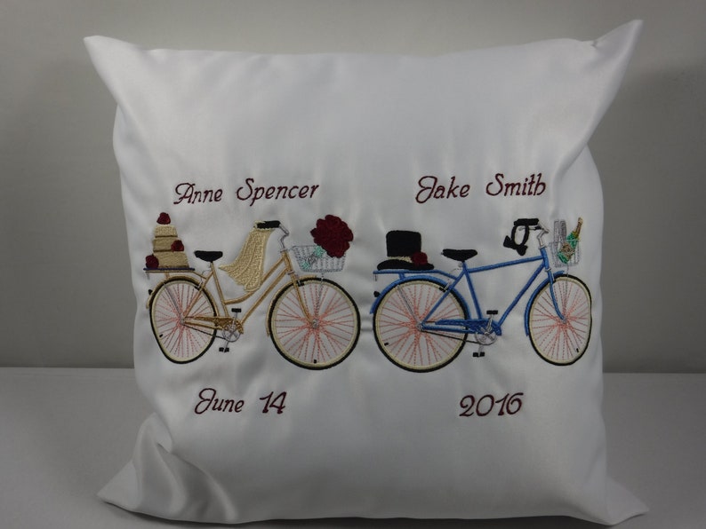 18 x 18 Wedding Anniversary Pillow White Fabric Embroidered With Bicycles