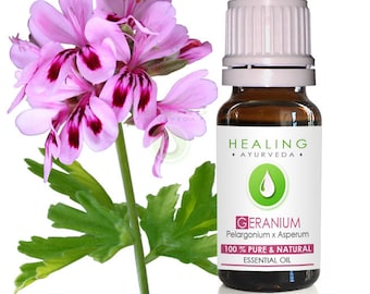May include: A bottle of rose geranium essential oil with a pink flower in the background. The bottle is labeled "Healing Ayurveda" and "Geranium Pelargonium x Asperum 100% Pure & Natural Essential Oil".