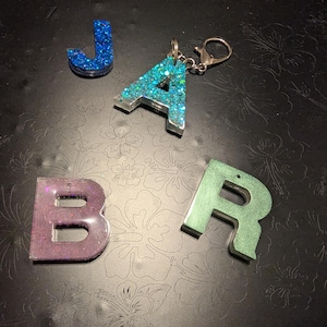 Hars initialen sleutelhanger/rugzakclip