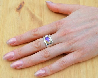 Rustikaler Ring aus 925/Silber und 750/Gelbgold und einem Amethyst.