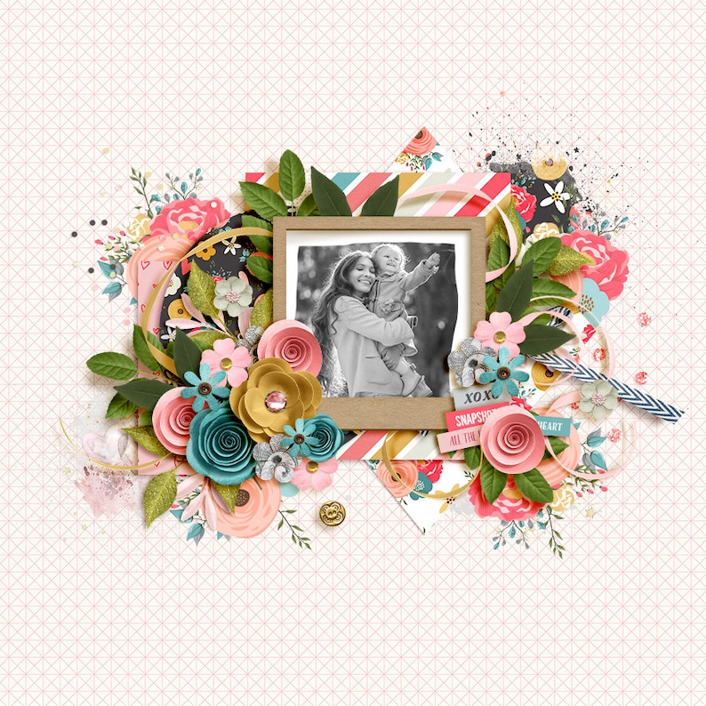 May include: A black and white photo of a mother and child in a frame surrounded by paper flowers, leaves, and decorative paper. The text "SNAPSHOTS ALL THE HEART" is visible in the image.