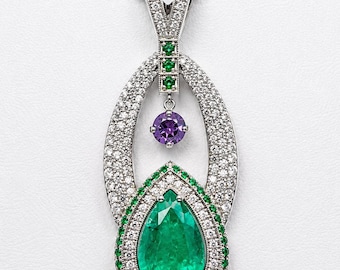 7.25 cts columbian emerald pendant in 14k white gold with GIA cert