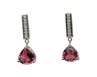 2.59 carats Pink Tourmaline dangle earrings in 14k white gold.  Accented with .14 carats of diamonds.