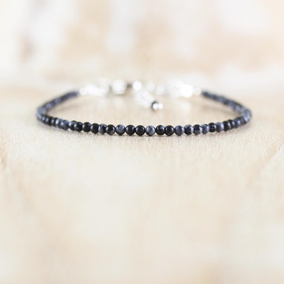 スノーフレークオブシディアンの繊細なブレスレット。スターリング