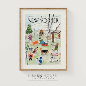 May include: A framed print of a New Yorker magazine cover featuring a whimsical illustration of dogs in a park setting. The artwork includes the magazine title, date, and price. The print is in a wooden frame.