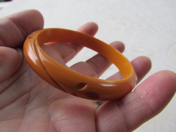 Deep Carved Butterscotch BAKELITE Bangle Bracelet - image 2