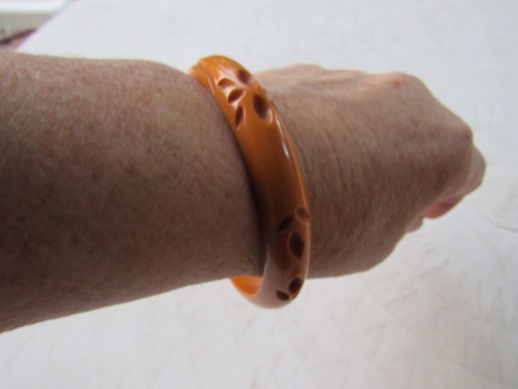 Deep Carved Butterscotch BAKELITE Bangle Bracelet - image 1