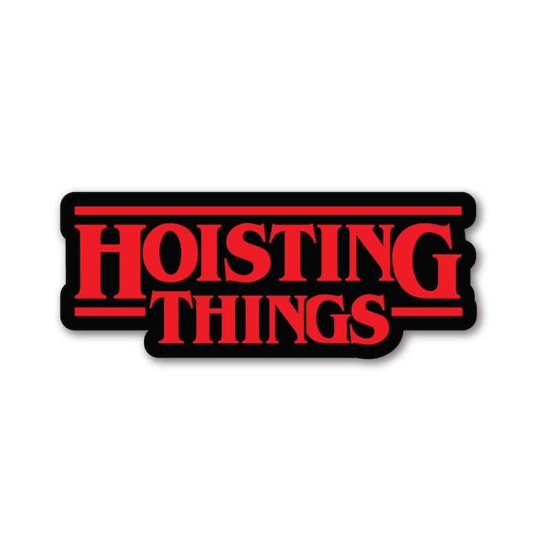 May include: A black and red sticker with the text "HOISTING THINGS" in a stylised font reminiscent of the popular television show "Stranger Things".