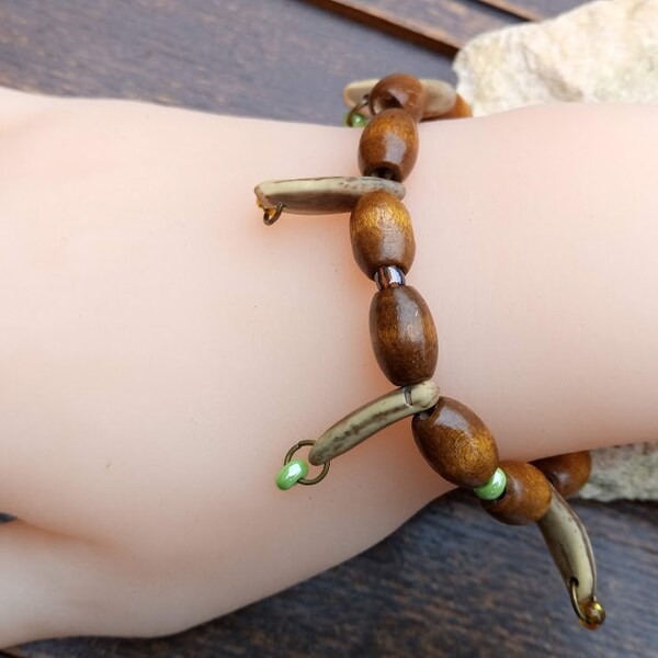 Perfect gift, stretchy acacia seed bracelet, wooden beads interspersed with silver beads, green and golden seed beads