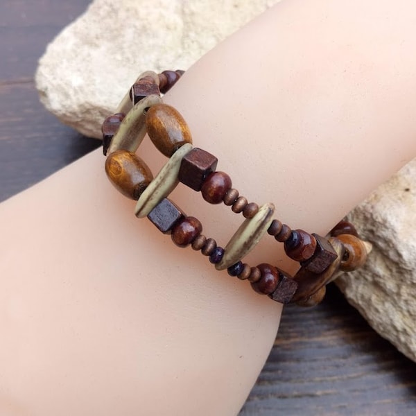 Perfect gift, double row cuff bracelet without clasp, round, square and oblong brown wooden beads and acacia seeds