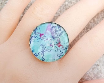 Cadeau parfait, Grande bague cabochon image corset glamour, sur fond bleu, support triple ajustable en métal argenté sans nickel