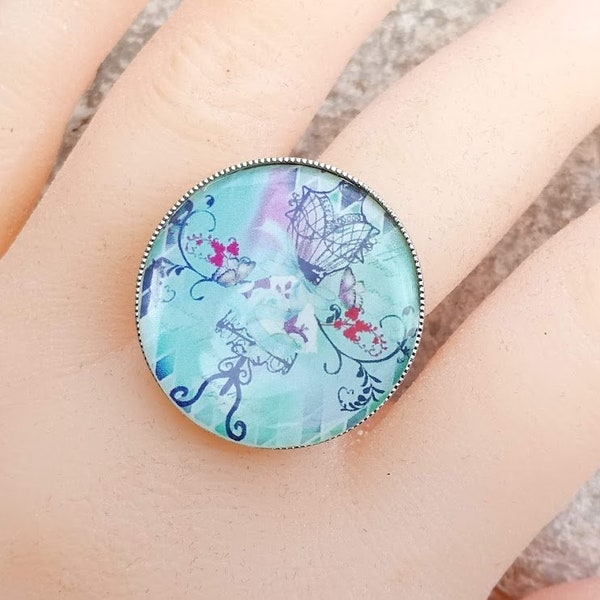 Cadeau parfait, Grande bague cabochon image corset glamour, sur fond bleu, support triple ajustable en métal argenté sans nickel