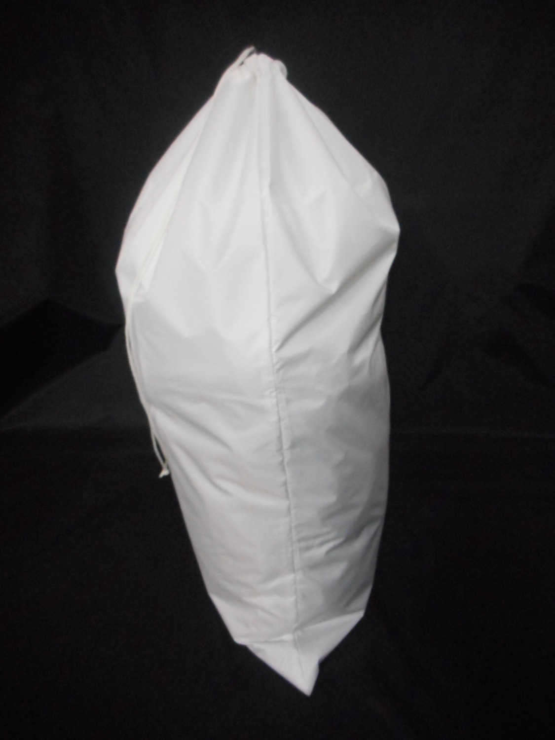 Laundry bag heavy duty Jumbo sized nylon holds approximately 40 lb Made in USA. 