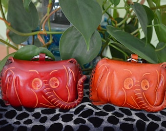 Genuine leather Change/coin purse,a Red Elephant face cover pattern, a small wristlet but it's cute.