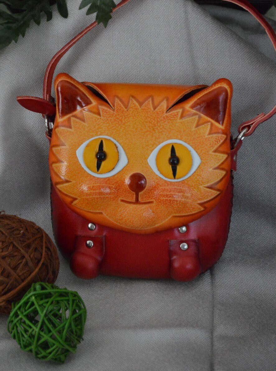 Premium AI Image | there is a white purse with a cat face on it generative  ai