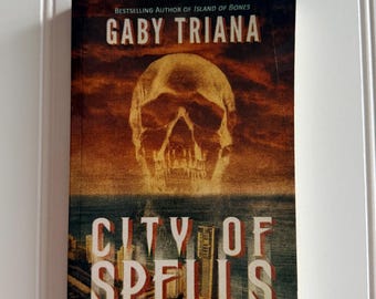 CITY OF SPELLS by Gaby Triana (Haunted Florida #3)