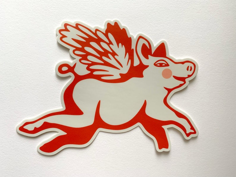 May include: A red and white sticker of a pig with wings. The pig is flying and has a happy expression on its face.