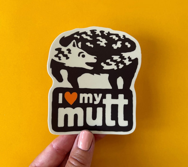 I love my mutt - dog / animal adoption - high quality bumper sticker / vinyl decal suitable for indoor / outdoor use including laptop, water bottle, etc. Waterproof. Made in USA