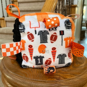 University of Tennessee Knoxville Vols Football Sensory Plush Minky Baby Block with Ribbons and Bells 5&quot; Baby Shower Toy Gift