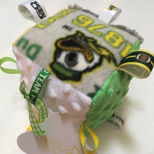 Oregon Ducks Football Sensory Plush Minky Baby Block with Ribbons and Bells  5&quot; square Baby Shower Toy  Gift