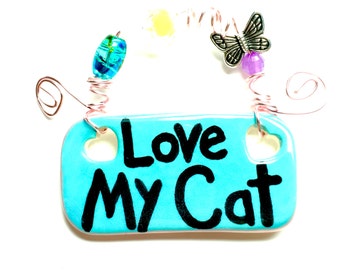 Love My Cat #556 blue ceramic sign