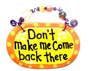 Don't make me come back there#611 yellow ceramic sign
