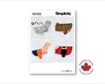 May include: A Simplicity pattern sheet featuring four dog coat designs. The coats include a floral print, camouflage, color block, and a Santa-themed coat. The sheet includes the text "S9426", "Simplicity", and a Canadian flag logo.