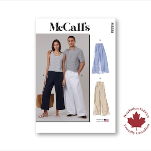 May include: McCall's sewing pattern M8588 showing a woman in a striped vest and navy trousers, and a man in a checked shirt and white trousers. The pattern includes illustrations of wide-leg trousers. The Dandelion Fabrics logo is visible.