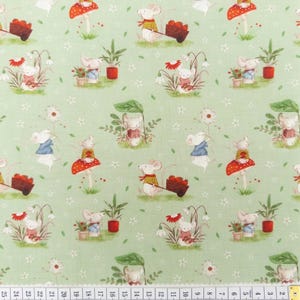 May include: A light green fabric with a repeating pattern of mice in a garden scene. The mice are shown with various activities, such as pushing carts of berries, sheltering under leaves, and near flowers and mushrooms. The design includes small white flowers.