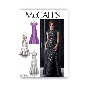 May include: McCall's sewing pattern M7865 for a long, fitted dress with a boat neckline and cap sleeves. The pattern includes three variations: a purple dress, a floral print dress, and a lace dress.