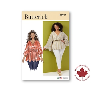 May include: A Butterick sewing pattern, B6931, shows illustrations and a photo of a wrap-style top. The top has a V-neck, gathered waist, and options for long, flared sleeves. The pattern includes the Dandelion Fabrics logo and is proudly Canadian.
