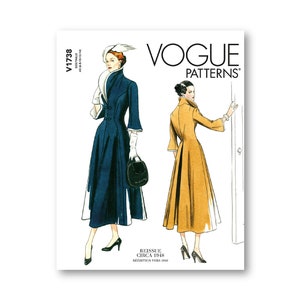 May include: Vogue Patterns V1738 reissue of a vintage dress pattern from circa 1948. The pattern features two illustrations of women wearing long, fitted dresses with a high neckline and a full skirt. The dress on the left is blue and the dress on the right is yellow.