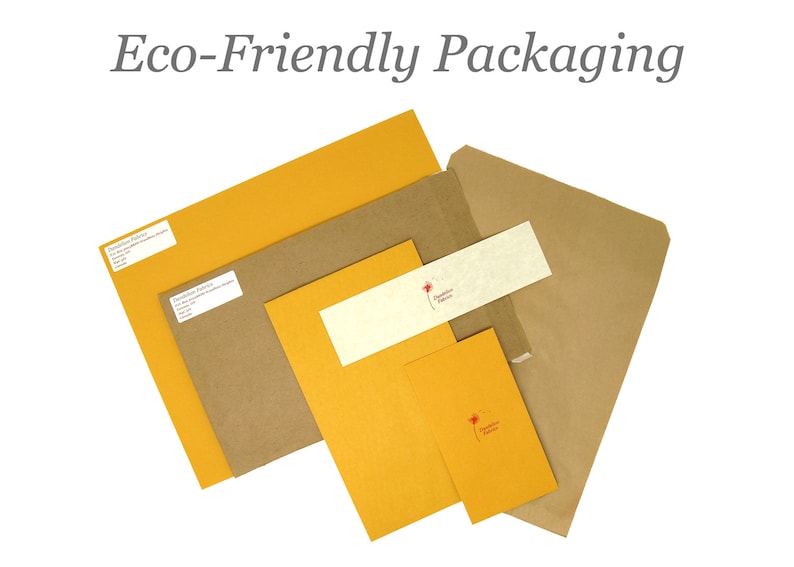 May include: Eco-friendly packaging made from recycled paper. The packaging includes a brown envelope, a yellow envelope, and a smaller yellow card with a red flower logo. The text "Sustainable Paper" is printed on the card.