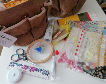 slow stitch starter kit, bag included, scissors, needles, hip. tape measure, ruler fabric and trim packs pins, thimble, hand dyed threads