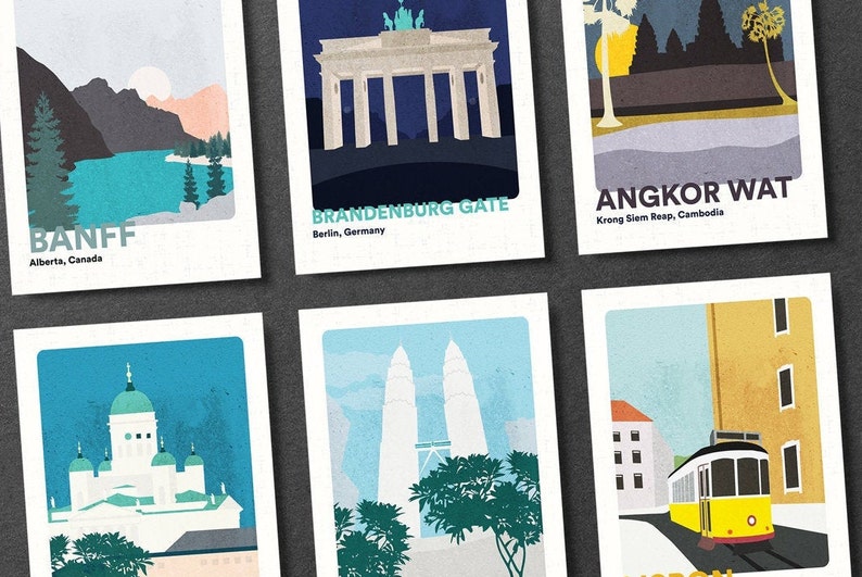May include: Six illustrated postcards featuring famous landmarks around the world. The postcards are white with a light blue, gray, and yellow color scheme. The landmarks include Banff, Brandenburg Gate, Angkor Wat, Helsinki Cathedral, Petronas Towers, and Lisbon.