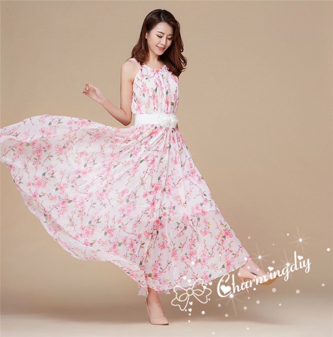 pink and white maxi dress Cotton Floral XL/42 Stand out at your next formal event by elevating your look with stylish accessories and heels to tie it all together Destene Floral Maxi Dress -