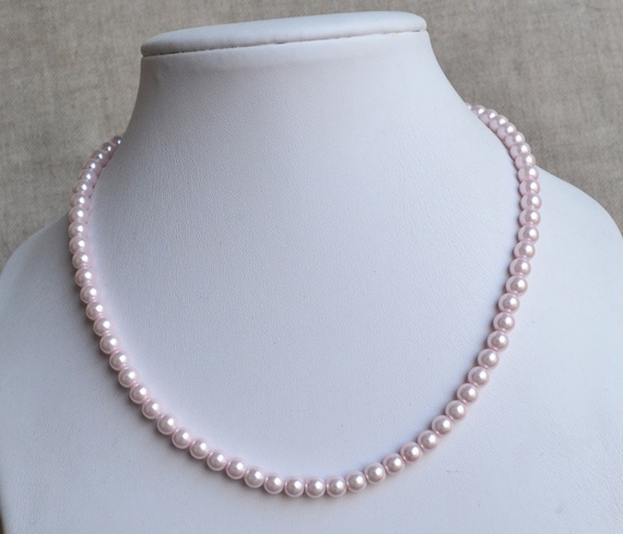 Baby pink pearl best sale necklace