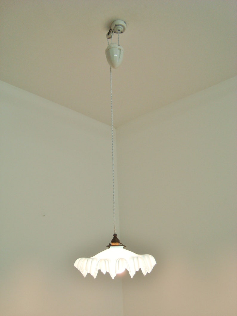 Vintage French rise and fall chandelier with a blue and white mottled glass shade