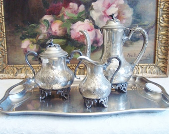 Antique tea set in Sheffield Silver plate chateau style decor